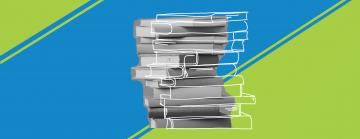 Stack of books over a green and blue background