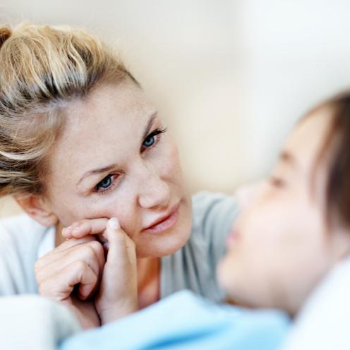 Mother at the beside of her girl.