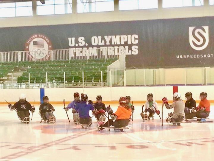 Team of adaptive sled hockey players at the US olympic team trials