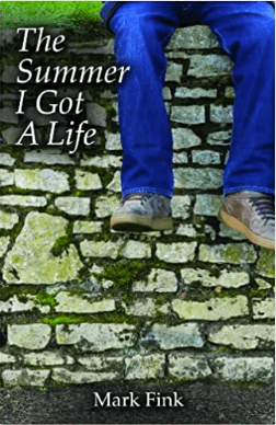 Boy in blue jeans and gray sneakers dangling his legs over a brick wall