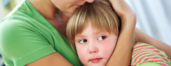 A mother comforting her child