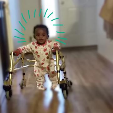 Tylynn (2 years old) using her walker