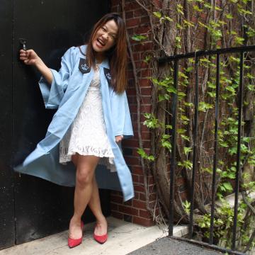 Image of author of this post, Sarah Kim, dressed in her college graduation gown