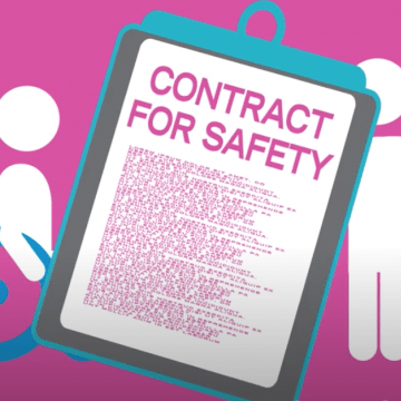 Family holding a contract for safety