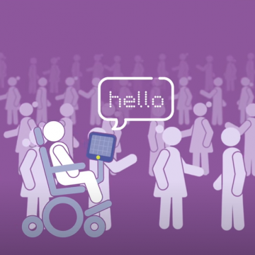 Representation of a person in a wheelchair using assistive technology to communicate with a group of people around them.