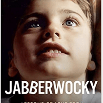 Photo of the face of a young boy with blue eyes that reads Jabberwocky: Lessons of Love from A Boy Who Never Spoke