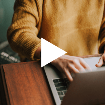 Image of someone working at a computer