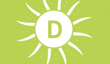 White sun over green background (vitamin D)