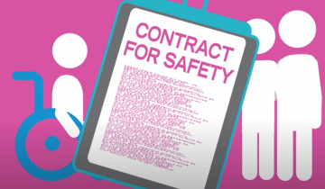 Family holding a contract for safety