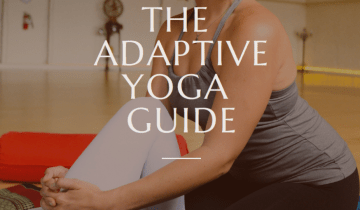 The cover image from the adaptive yoga guide showing Caroline Hughes practicing an assist in a yoga pose