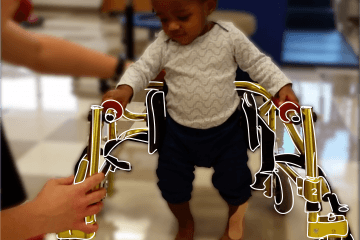 Tylynn, 2 years old, using their walker