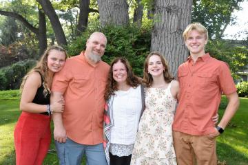 Stacy Mcneely with her husband and three young adult children.