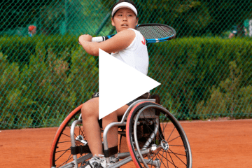 Thumbnail of woman in wheelchair playing a sport with play button overlayed
