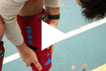 Thumbnail image of boy adjusting knee sleeve